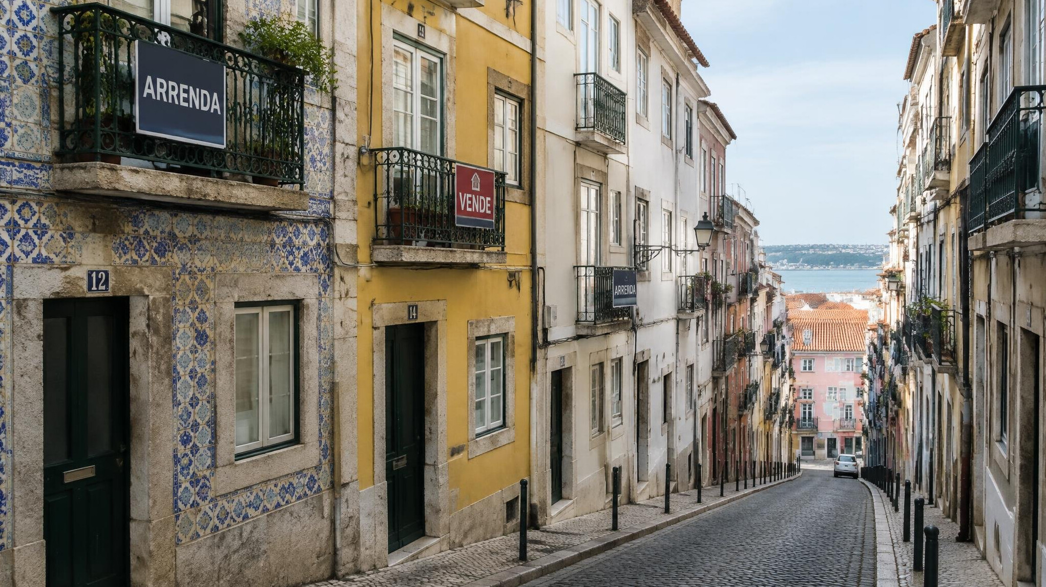 Rental apartment building with for-rent signs in a Portuguese street